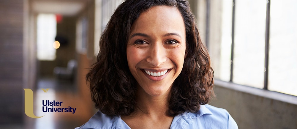 Close up of smiling female health psychologists - banner image for 6 essential skills for health psychologists blog